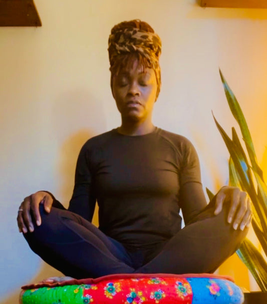 Nefertari taking a peaceful meditation & breathwork break in what she calls the Zen Room" of her home.